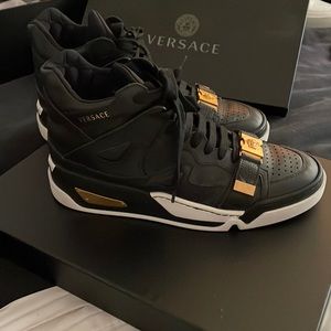 Original Versace shoes. Black with gold. Men size 8.5. Wore them twice. Too big!